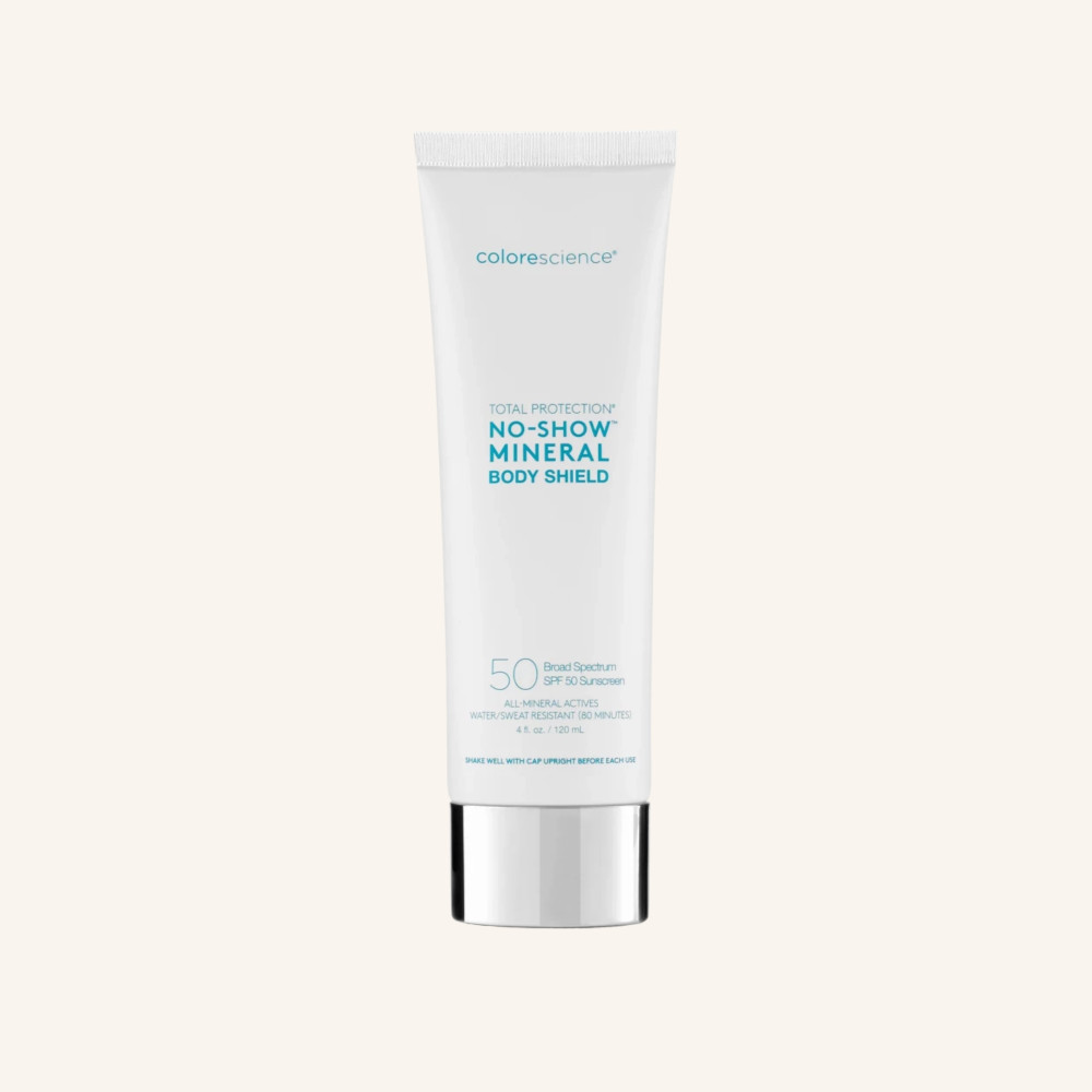 Прозорий мінеральний сонцезахисний флюїд для тіла SPF 50